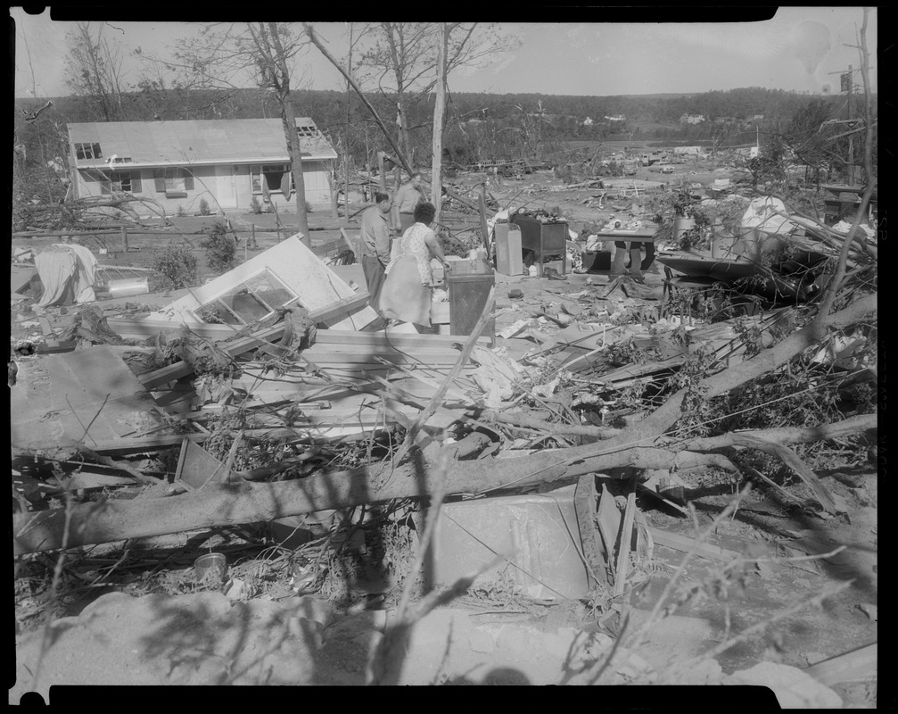 People going through remains of houses - Digital Commonwealth