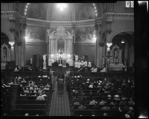 People in church attending a funeral