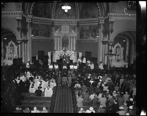 People in church attending a funeral