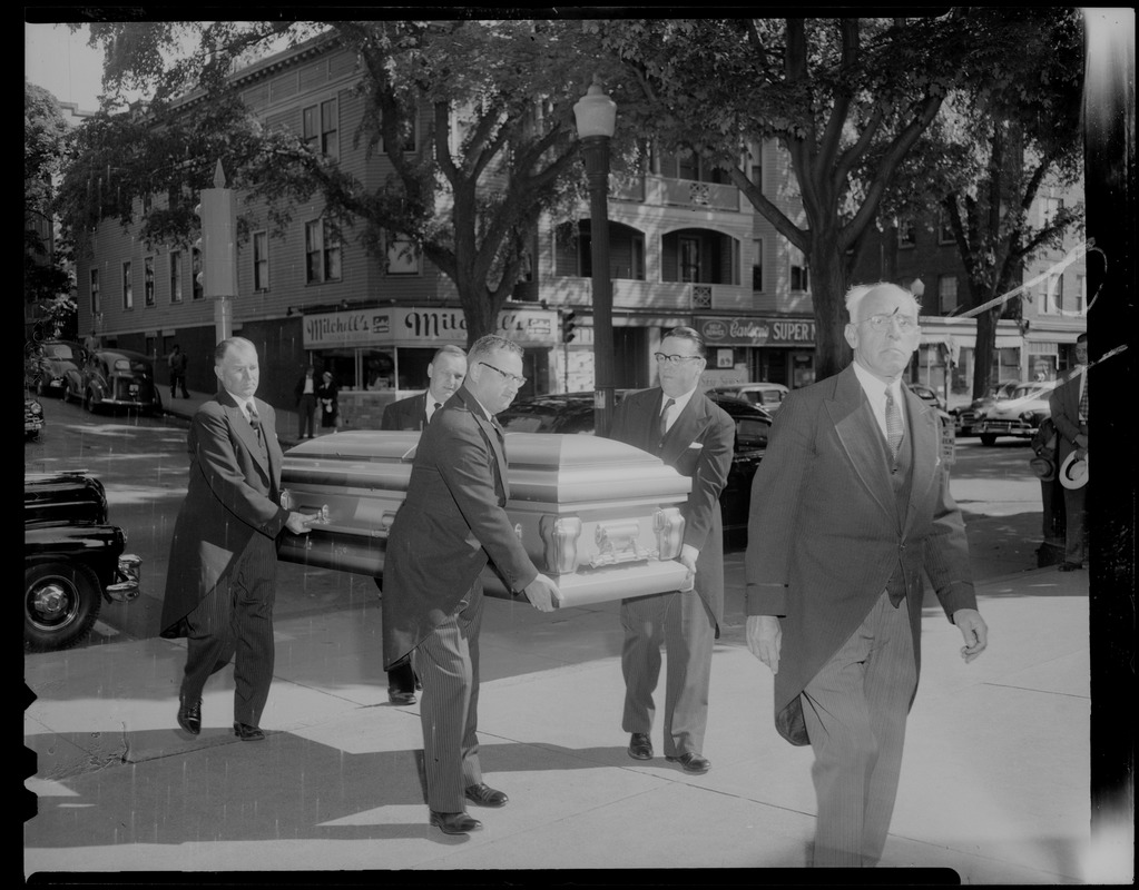 Pallbearers with coffin