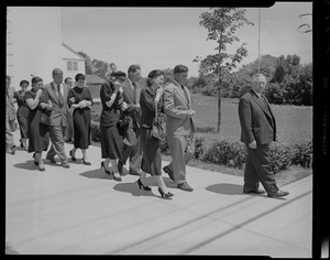 Procession at funeral with women crying