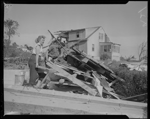 Man and woman assessing damage