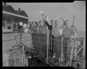 Crew waving from the bridge