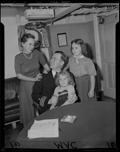 Navy officer with wife and two daughters