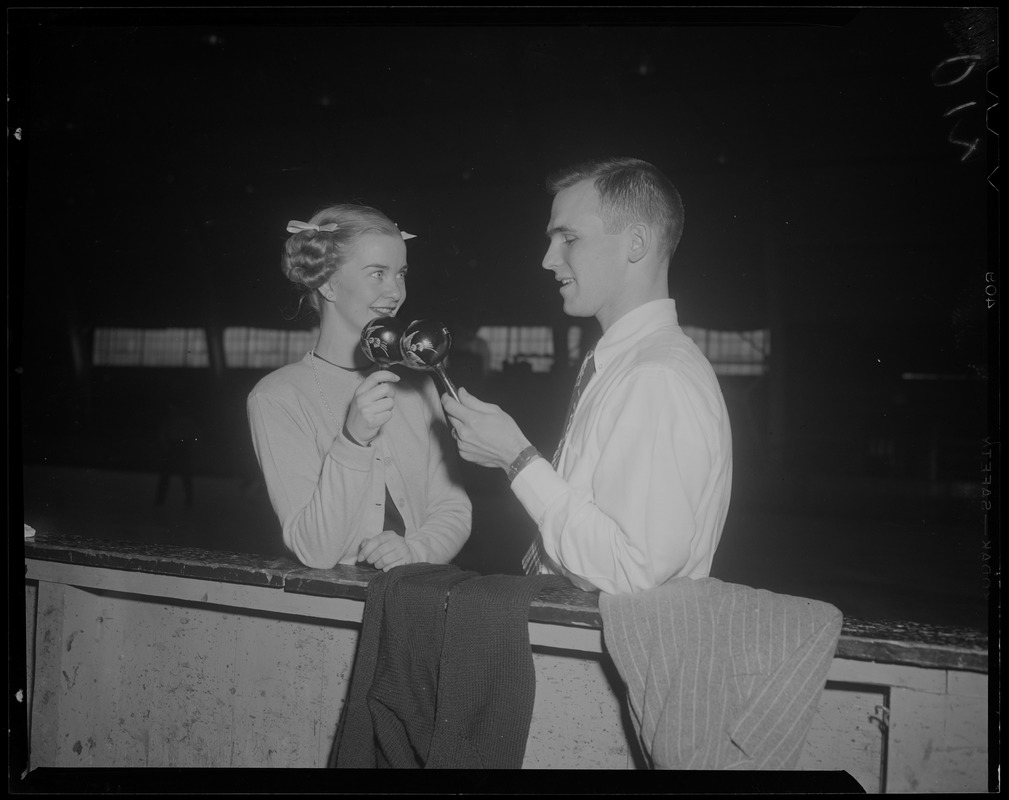Barbara Ann Scott and a man, holding maracas