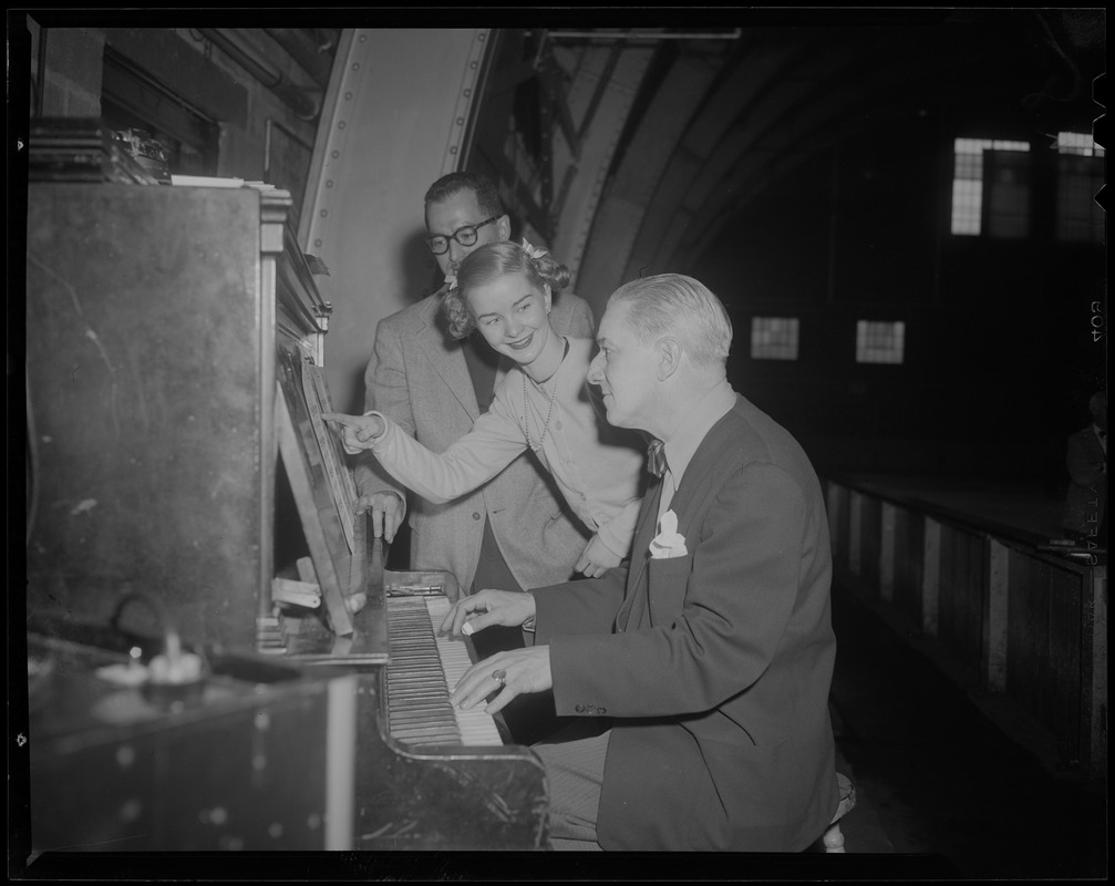 Barbara Ann Scott with two men, at the piano