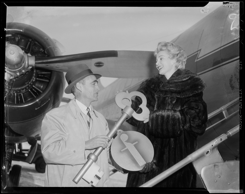 Zsa Zsa Gabor receiving the Filene's Golden Key to Boston from ...
