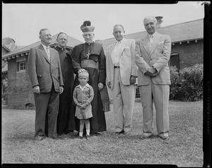 Archbishop Richard J. Cushing, Mayor Hynes, three men and a young boy