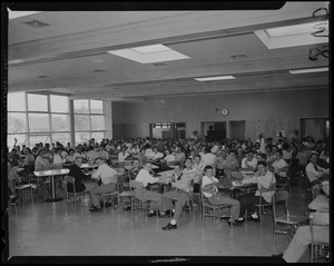 Large group of people sitting at tables
