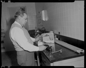 Man using a piece of lab equipment