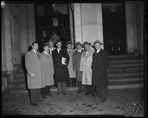 Portrait of men standing outside of a building including in front row: Reps. John F. Thompson, Charles Gibbons, Charles Ferguson and John McMorrow
