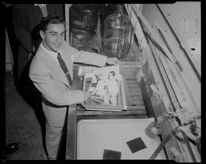 Tony DeSpirito developing a photograph of himself and his dog