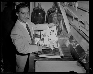 Tony DeSpirito developing a photograph of himself and his dog