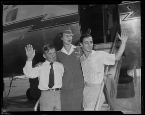 Tony DeSpirito, Harold "Red" Keene and flight attendant on airplane steps