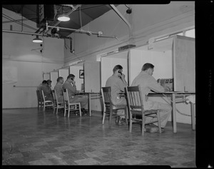 State Police trainees in communications room of Civil Defense, rear of State Police Headquarters - Framingham - at police radio and telephones - ready to inform all agencies of the hurricane's path