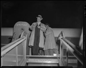 Adlai Stevenson exiting a United airplane