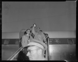 Adlai Stevenson exiting a United airplane