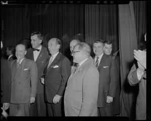 Adlai Stevenson and group of men, looking off camera