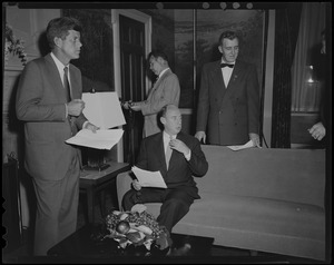 Adlai Stevenson meeting in a room with John F. Kennedy and two others