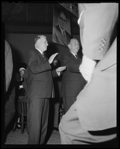 Mayor John B. Hynes and Adlai Stevenson standing and clapping