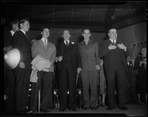 Borden Stevenson, John Fell Stevenson, Adlai Stevenson II, Adlai Stevenson III and Paul Dever standing on stage