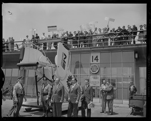 Crowds greeting Adlai Stevenson on arrival at airport