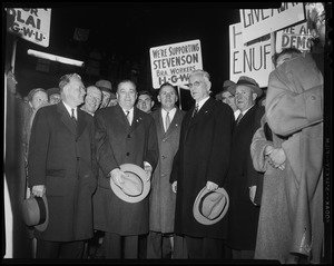 Mayor John B. Hynes, Paul Dever, Foster Furcolo and two other men standing in front of Stevenson supporters