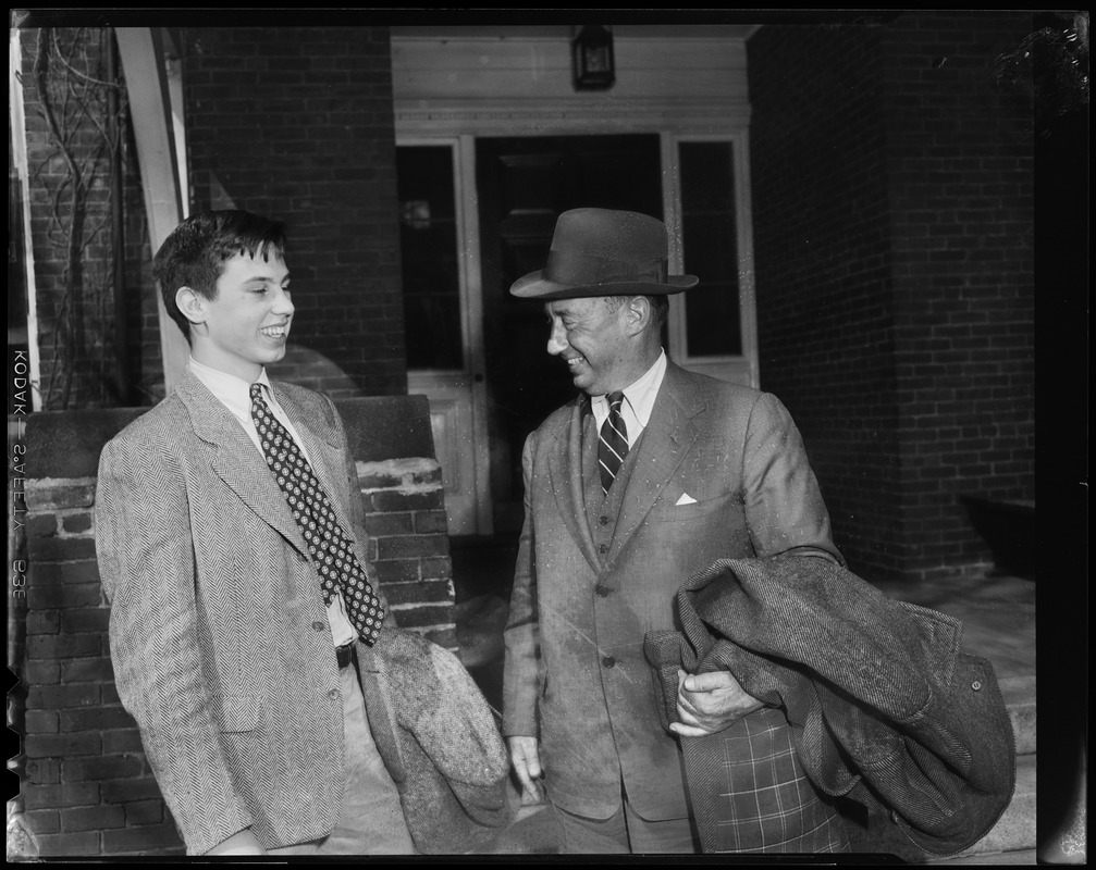 Adlai Stevenson standing with his son John Fell Stevenson