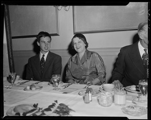 John Fell Stevenson and a woman seated at a dinner table