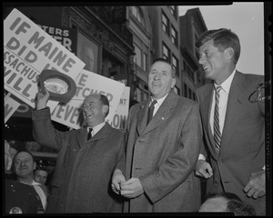 Adlai Stevenson, Foster Furcolo and John F. Kennedy standing among supporters