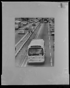 MBTA bus on a highway driving against traffic during 'Operation Wrongway' trial