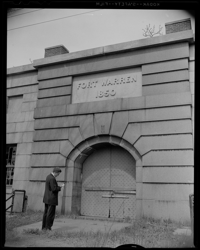 Man standing before an entrance of Fort Warren