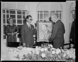 King Bhumibol Adulyadej of Thailand being presented a portrait of himself