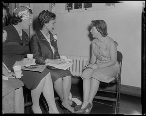 Queen Sirikit of Thailand sitting with two other women