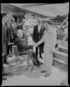 King Bhumibol Adulyadej of Thailand shaking hands with Mayor Collins