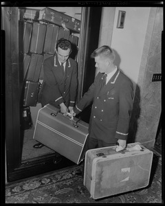 Bellhops with luggage
