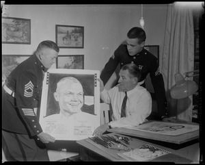 Bob Coyne, John H. Glenn and one other man holding portrait of Lieutenant Colonel John H. Glenn Jr.