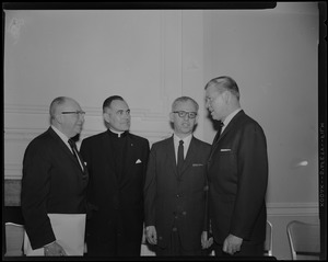 Arthur J. Goldberg, center, chats with Rev. Theodore M. Hesburgh, near left, and Jack Lescoulie, far right and another man