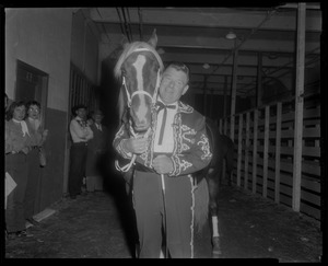 Arthur Godfrey and his horse "Goldie" appearing for the Rodeo at the Boston Garden