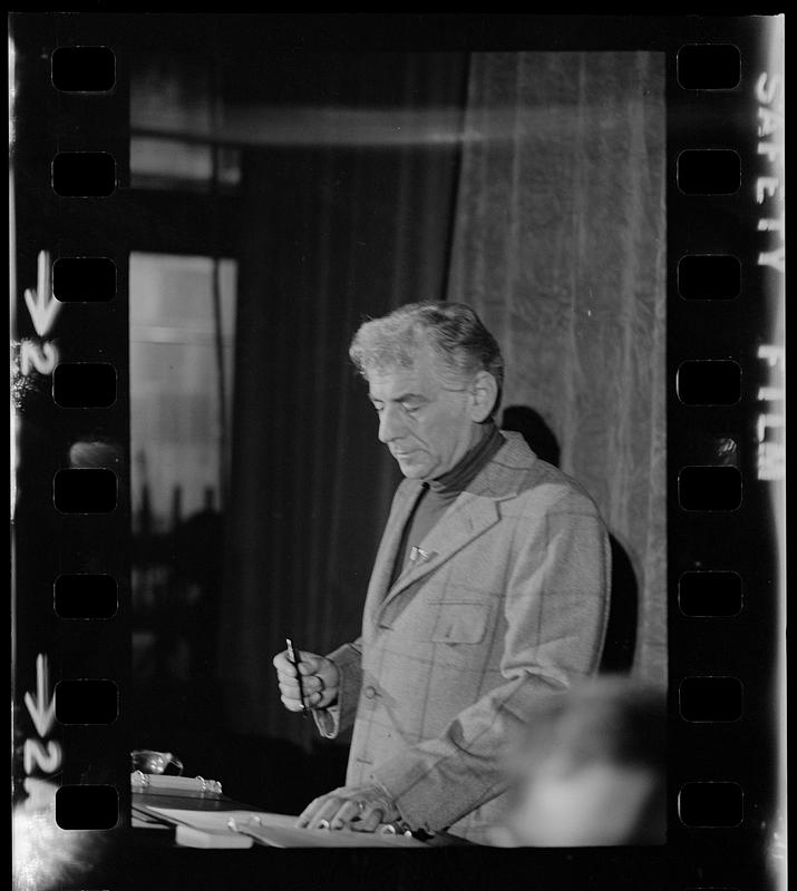 Leonard Bernstein rehearses a speech at Harvard's Sanders Theatre, Cambridge