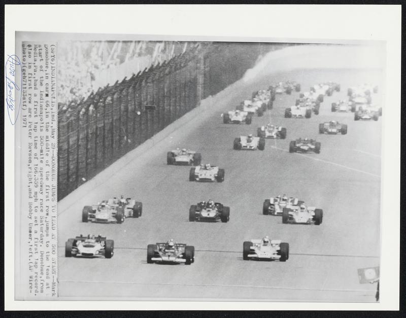 Donohue Jumps To Lead At 500 Start. -- Mark Donohue, in car 66, in the middle of the first row, jumps to the lead at start of the Indianapolis 500-mile speedway race Saturday. Donohue, from Media, Pa., had a first lap time of 166.359 mph to set a first lap record. (Also in first row are Peter Revson, right, and Bobby Unser, left).