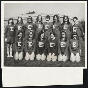 Sporting a big "E" are these Everett High school cheerleaders. Front, from left, Debbie Nuzzolo, Sharon Diamond, Jackie Nelson, and Paula Leavitt (co-capts.), Rosanne De Ceare, and Martha Sharpe. Rear, Nancy Barry, Elaine Shea, Sheryll Erickson, Suzi Sykes, Pami Mazzel, Pam Kelleher, Marylou Stephenson and Elaine Scotti.
