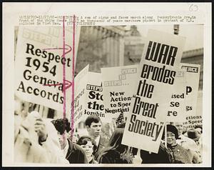 A sea of signs and faces march along Pennsylvania Ave. in front of the White House 11/27 as thousands of peace marchers picket in protest of U.S. policies in Vietnam.
