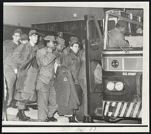 US Postal Strike Caption: Soldiers board bus at Fort Dix, New Jersey, for trip to New York City where they will help in processing mail. Troops were ordered into the city by President Nixon.