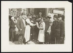 Paterson, N.J., mill strike - Bread line of strikers at restaurant where rations are distributed daily. The I.W.W., under whose auspices the strike is being run, started the bread lines when the prediction was made that the strikers would soon have to return to work of starve.