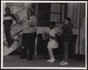Children and adult performing music