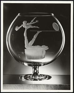 A Globular bowl with an original design by Pavel Tchelitchew included in an exhibition of decorations in glass by twenty-seven world famous artists commissioned by Steuben Glass, Inc., entitled "Twenty-seven Artists in Crystal".