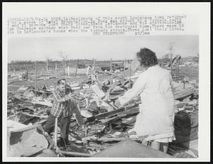 La Rose, La: residents of this south Louisiana town returned to a scene of total devastation. La Rose was struck by a tornado early and 21 persons lost their lived. Lewis LeBlanche and his sister-in-law ma Cheramie salvage what they can from his destroyed home. There were 16 ple in LeBlanche's house when the tornado struck. Three lost their lives.