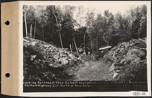 Contract No. 44, Extension of Belchertown-Pelham Highway, New Salem, Orange, looking northwest thru culvert excavation at Sta. 943+25, New Salem, Mass., May 18, 1934