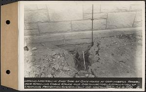 Contract No. 105, Lightning Protection for Buildings, Barre, Belchertown, Hardwick, Marlborough, Rutland, Southborough, Weston, West Boylston, looking westerly at east side of gatehouse at Norumbega Reservoir showing cable splice and disconnector, Weston, Mass., Jul. 11, 1941